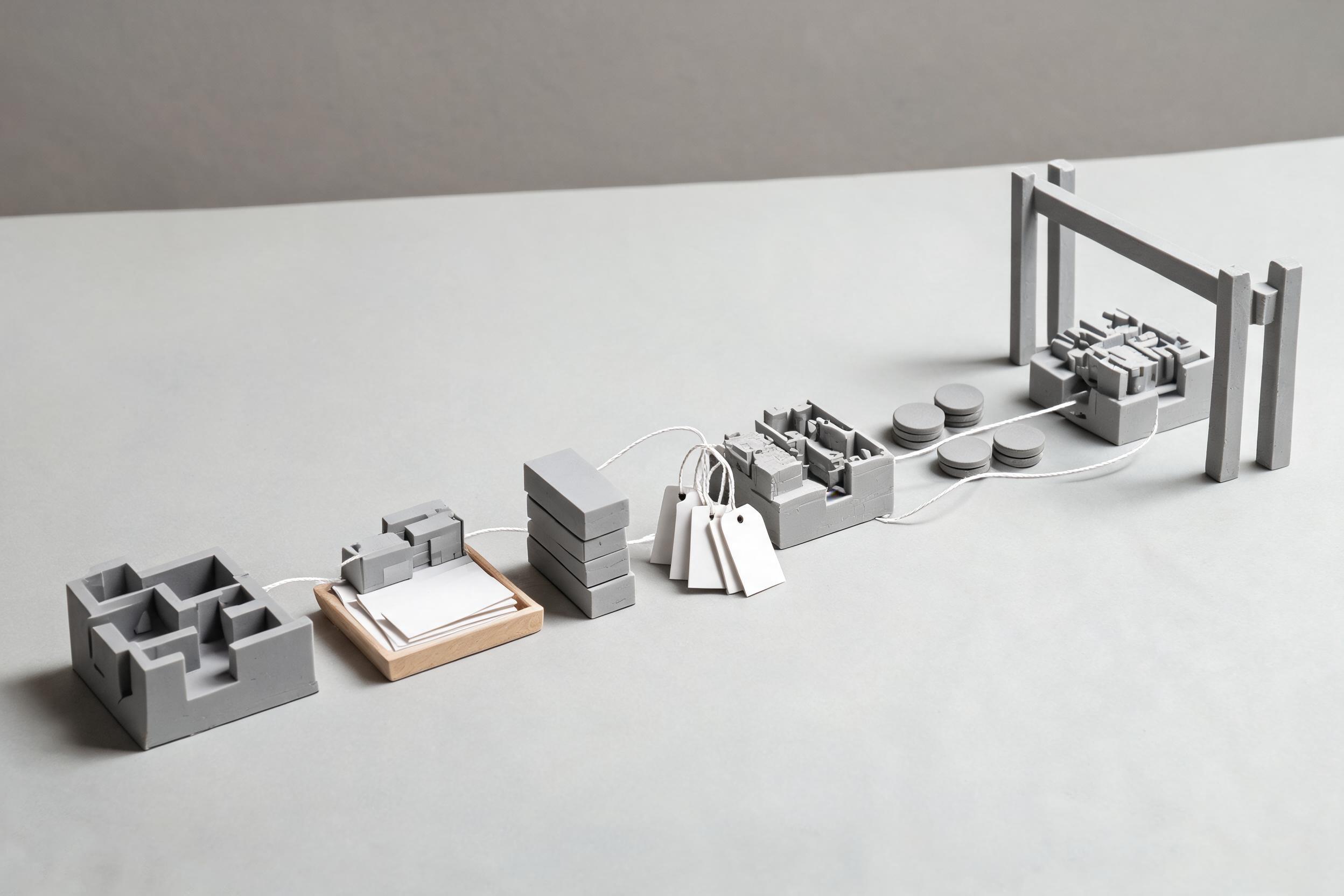A greybox level moving through a brief tray, code blocks, provenance tags, test tokens, and an approval gate