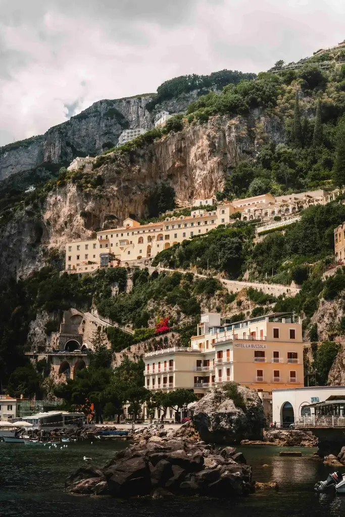 A coastal village built into a dramatic cliff